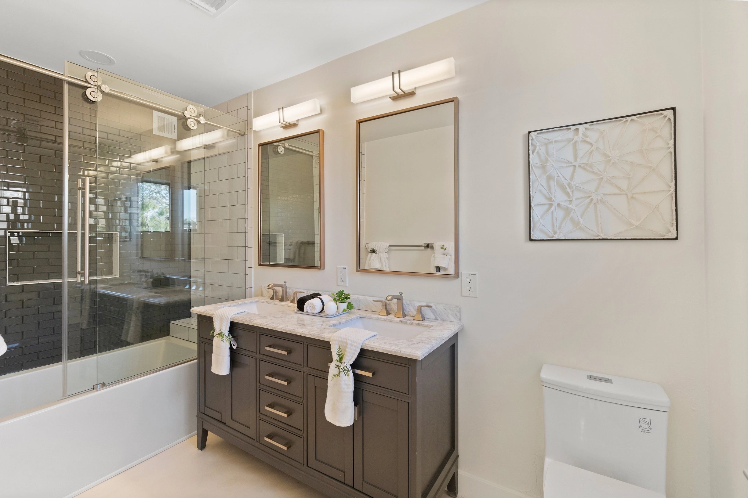 Bespoke bathroom vanity with custom stone surfaces