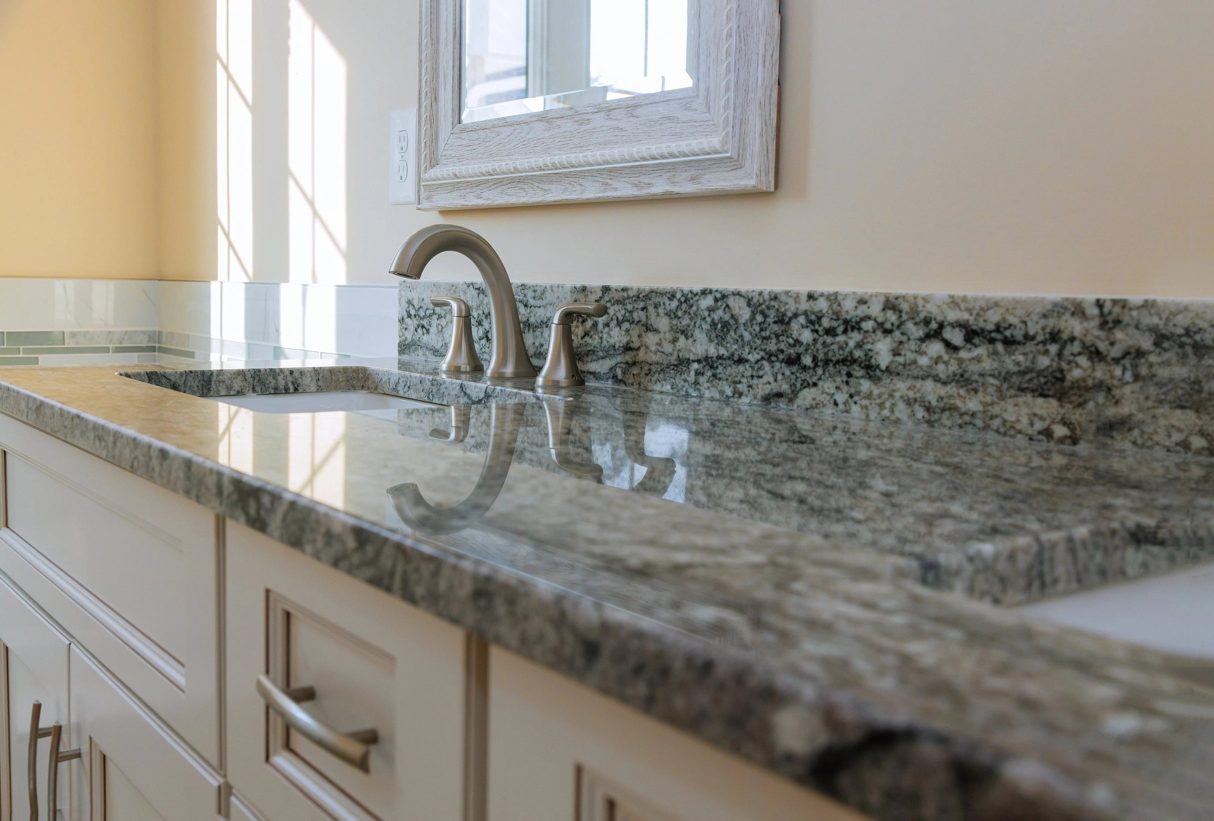 High-end bathroom countertops in granite and quartz