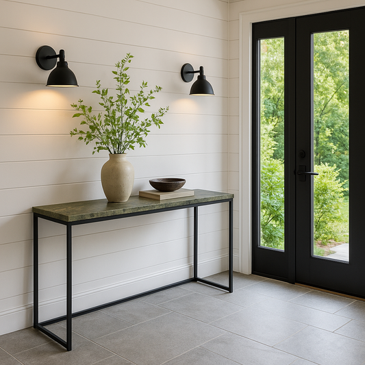 Foyer with textured stone flooring and camo-green quartzite console table under garden-inspired sconces