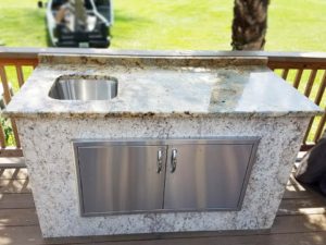 small granite outdoor kitchen